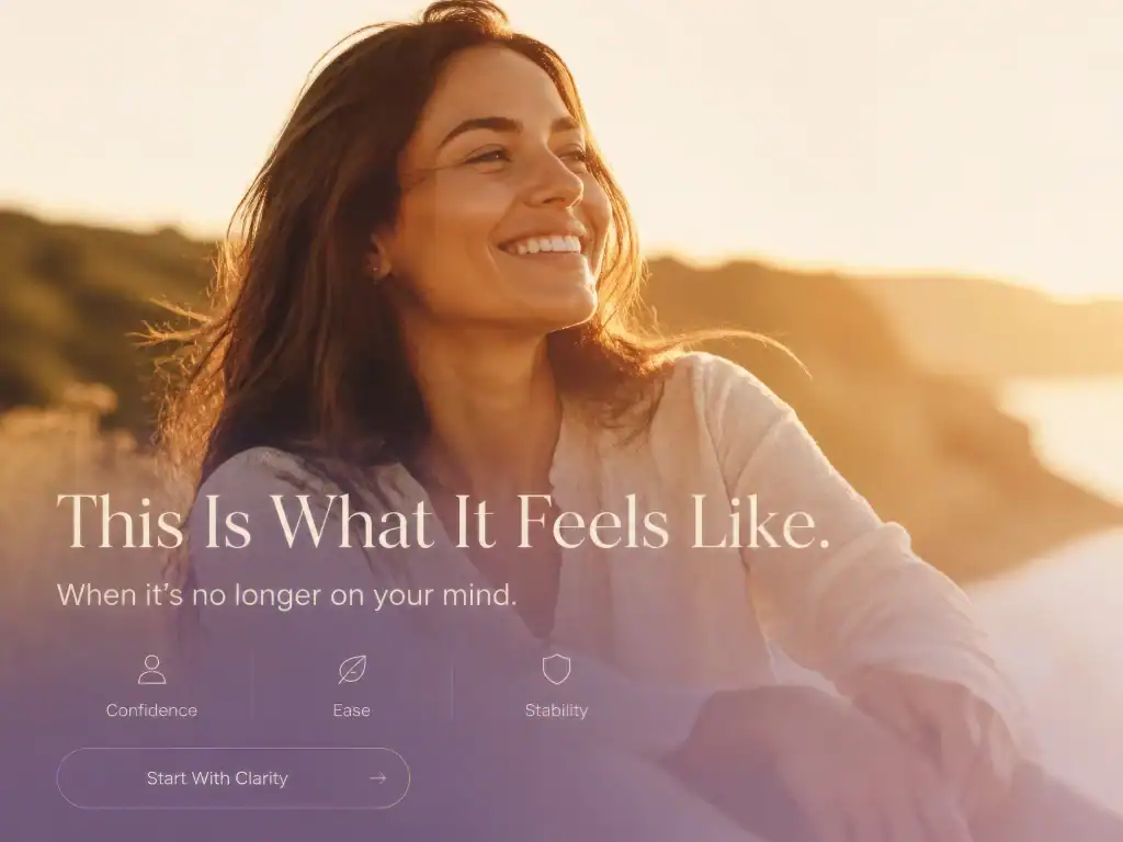 A woman smiling outdoors during sunset, representing confidence and well-being.